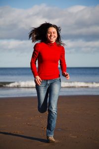 girl running on beach